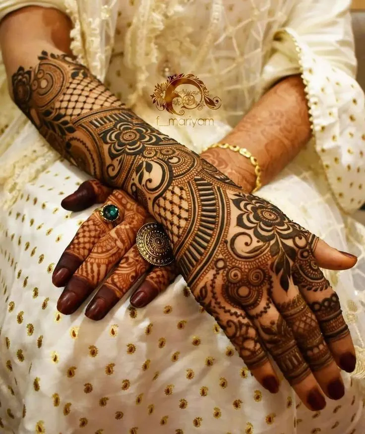 Famous backhand mehndi designs for bridal by mehndidesigns4u