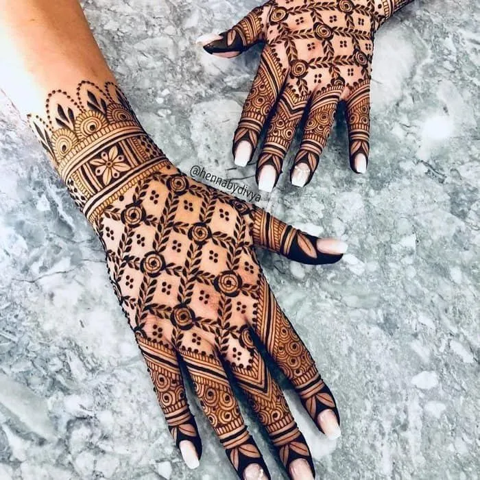 Pretty Back Hand Mehendi Designs by mehndidesigns4u