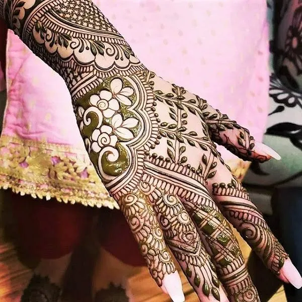 Pretty Back Hand Mehndi Designs by mehndidesigns4u