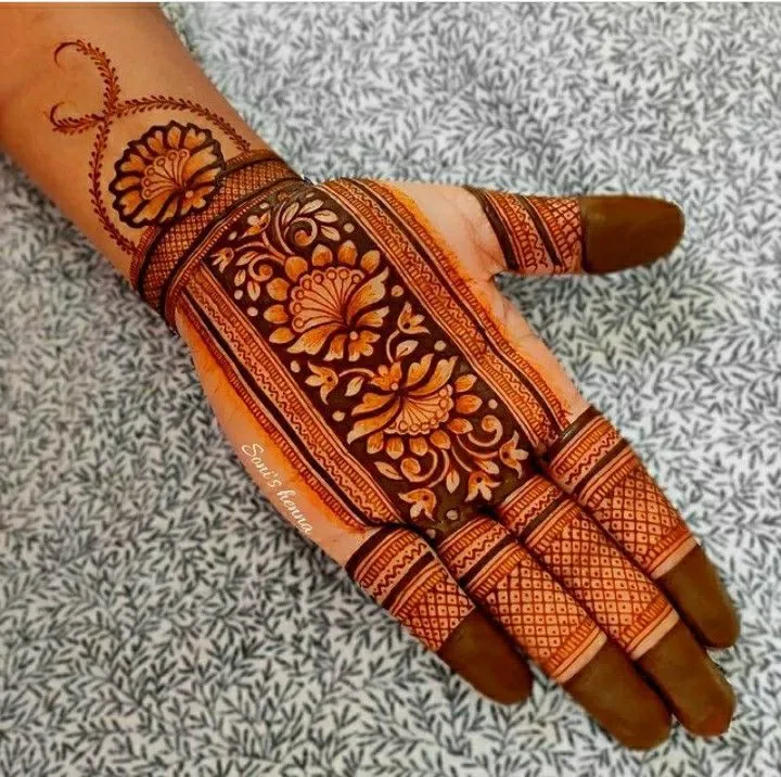 Royal Half Front Hand Mehndi Design with floral motif