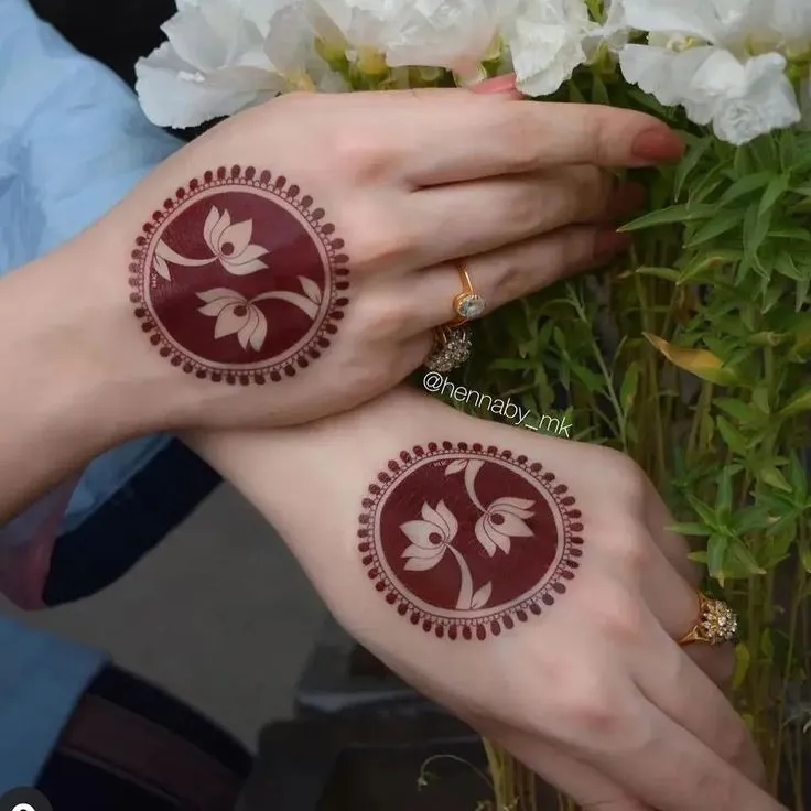 Simple Circular Motifs with lotus design on back hand